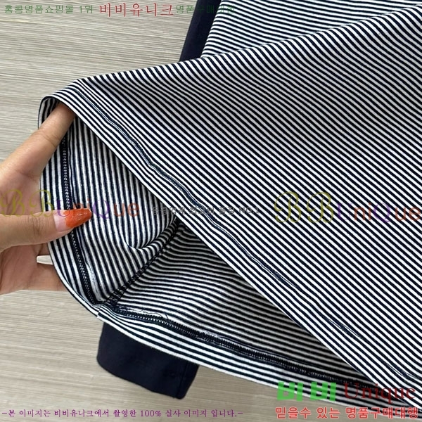   Ƽ CE233658-9